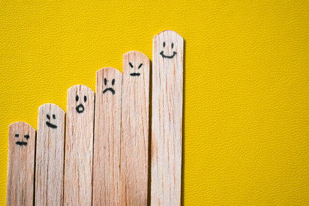 stick of ice cream with expression emotion, smile, angry, surprise. Motivational quotes, optimism, positive words. Isolated on backgroundの写真素材