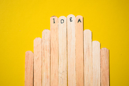 stick of ice cream with the words Idea. Motivational quotes, optimism, positive words. Isolated on backgroundの写真素材