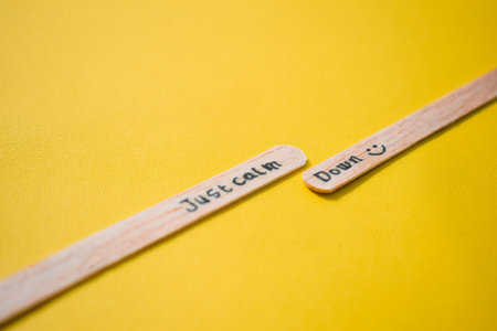 stick of ice cream with the words Just calm down. Motivational quotes, optimism, positive words. Isolated on backgroundの写真素材