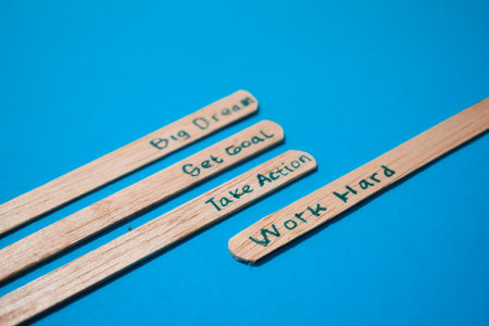 stick of ice cream with the words Big dream, Get goal, Take action, Work hard. Motivational quotes, optimism, positive words. Isolated on backgroundの写真素材