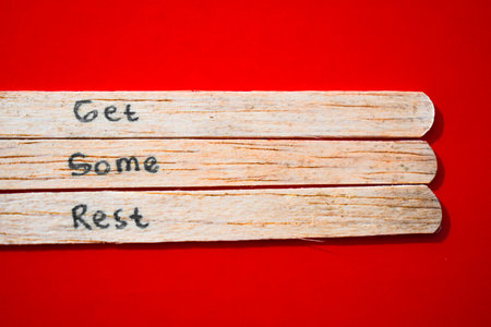 stick of ice cream with the words Get Some Rest. Motivational quotes, optimism, positive words. Isolated on backgroundの写真素材