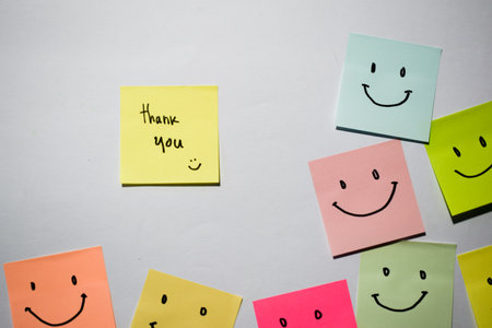 Thank you and smile emoticon on sticky notes. Motivational for personal development, inspirational...
