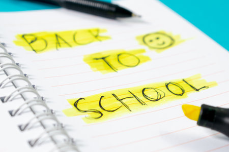 Notebook with writing Back to School with green stabiloの写真素材