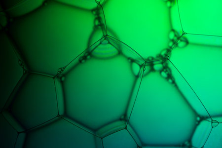 Abstract background of biotechnology, macro photography of foam and water with gradient background....