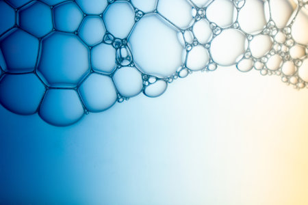 Abstract background, macro photography of foam and water with gradient background. Multicolor backgroundの写真素材
