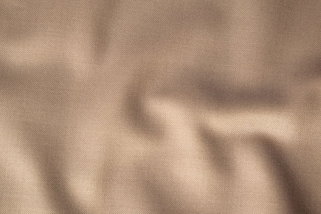 Wavy smooth pattern brown fabric background texture.の写真素材