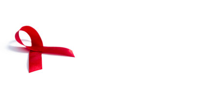 Red ribbons, HIV awareness concept, world AIDS day, world hypertension day, world cancer day with...