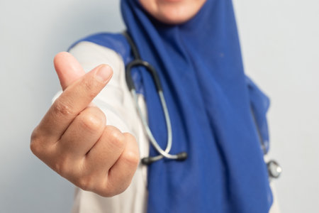 Muslim Female asian doctor or nurse. Isolated white background. Medical, healthcare and nurse concept.の写真素材