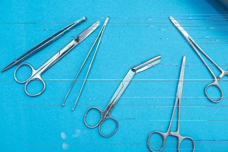 Set of Surgery Instrument over blue background. Include Scissors and forceps. Medical equipment kitの写真素材