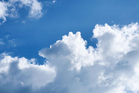 Aerial white clouds on blue sky. Blue sky background nature. Beautiful aerial cloudscape view from above, sunny landscape, bright cloudy sky view from bottom with copy spaceの写真素材