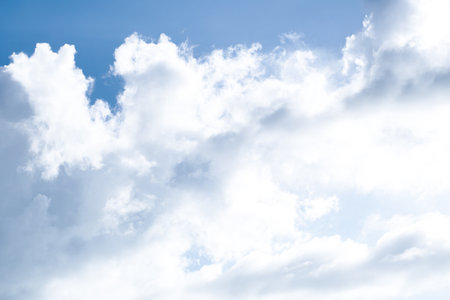 Aerial white clouds on blue sky. Blue sky background nature. Beautiful aerial cloudscape view from above, sunny landscape, bright cloudy sky view from bottom with copy spaceの写真素材