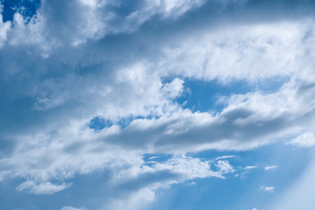 Aerial white clouds on blue sky. Blue sky background nature. Beautiful aerial cloudscape view from above, sunny landscape, bright cloudy sky view from bottom with copy spaceの写真素材