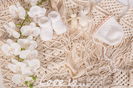 Mockup for announcement pregnancy . Space for text on textile backgroundの写真素材