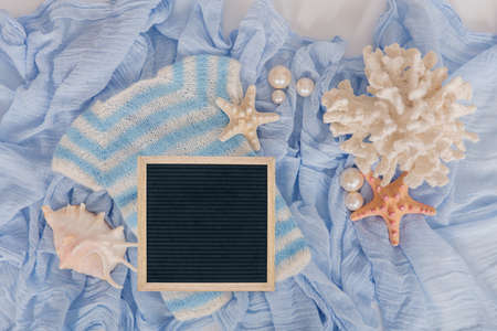 Mockup for announcement pregnancy . Space for text on textile backgroundの写真素材