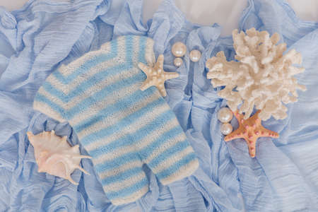 Mockup for announcement pregnancy . Space for text on textile backgroundの写真素材