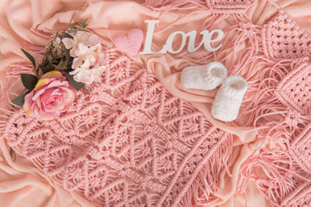 Mockup for announcement pregnancy . Space for text on textile background