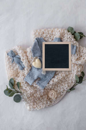 Organic newborn accessories. Social Media Baby Announcement.の写真素材