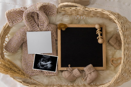 Letter board Baby Announcement with basket. Baby Clothing Mock Up . Space for design . Pregnancy...