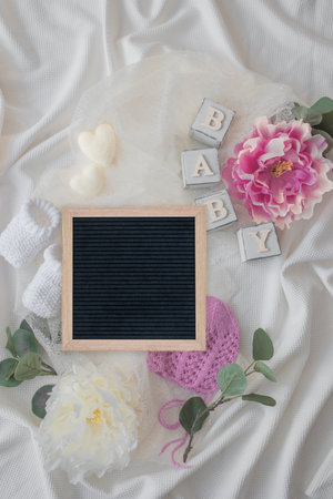 Pregnant Announcement Template. Design gender neutral bodysuit template. Layout for the design and placement with blurred . selective focusの写真素材