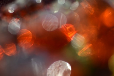 Joyful, bright, abstract background with colored bokeh circlesの写真素材
