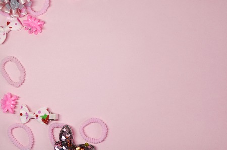 Cute kids hair claws on white background. Hair clips, hairpins, bow tie on white background. Fashion design hair accessories for little girls.の写真素材