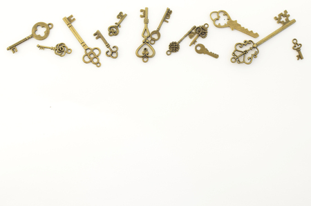 Decorative keys of different sizes, stylized antique on a white background.の写真素材