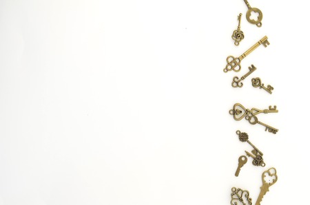 Decorative keys of different sizes, stylized antique on a white background.の写真素材