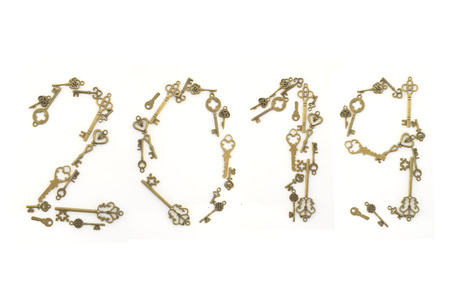 Decorative keys of different sizes, stylized antique on a white background. Form the centerpiece.の写真素材