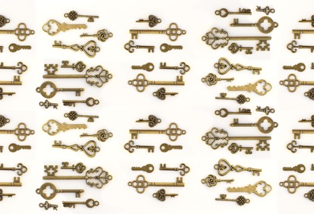Decorative keys of different sizes, stylized antique on a white background.の写真素材