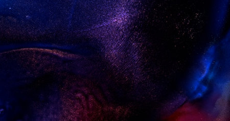 Dark violet blue shiny defocused abstract background. Closeup black purple twinkling ink. Dark shining lilac wallpaper texture. Glamour blur glow. Glittering paint. Fluid art backdrop. Shimmer artworkの写真素材