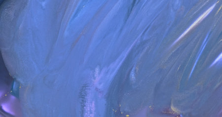 Blue glitter abstract liquid background. Blue shiny moving colorful fluid paint. Colorful liquid art texture. Fluid art drawing pattern. Liquid paint mixing backdropの写真素材