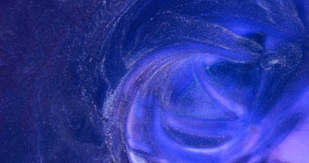 Blue shiny flow paint abstract backdrop. Swirl, flow Bright blue fluid art. Colors ink in motion. Purple-blue mix, splash liquid. Colorful shimmering acrylic. Floating glow particle. Sparkle shineの写真素材