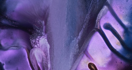 Purple paint wave flow down. Amazing white-purple ink foam flowing background. Shiny ink mix background. Fluid backdrop. Acrylic move pattern texture. Dark pink liquid river color artの写真素材