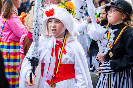 Binche, Belgium - February, 2019: Participants in the Carnival of the city of Binche in Hainaut,...