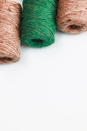 Tree coil of jute rope for packing on a white background.の写真素材