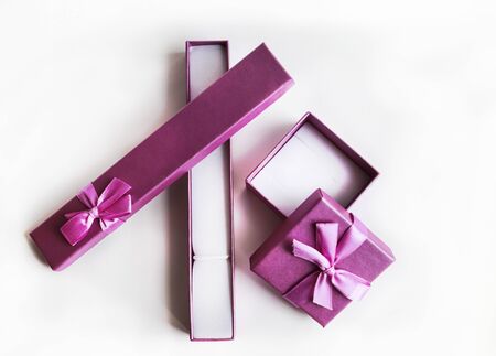 The violet opened present boxes on a white background. Top viewの写真素材