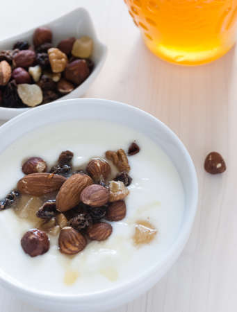 Yogurt with muesli and nutsの写真素材