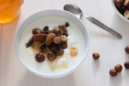 Yogurt with muesli and nutsの写真素材