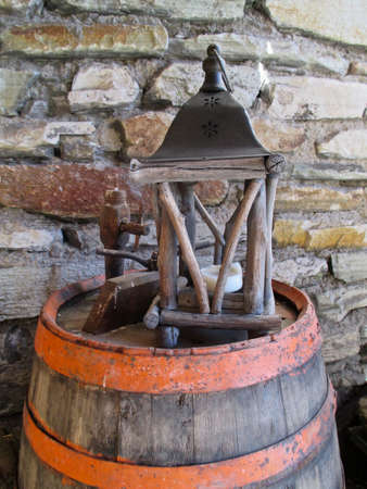 old wooden wine barrel with lanternの写真素材