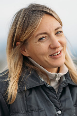 Portrait of a friendly smiling beautiful woman looking at camera with expression You are joking, this cant be truth. High quality photoの写真素材