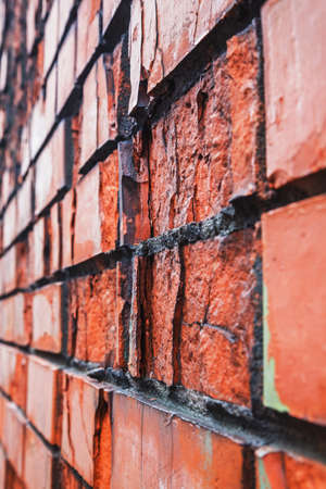 Perspective view of old red destructed brick wallの写真素材