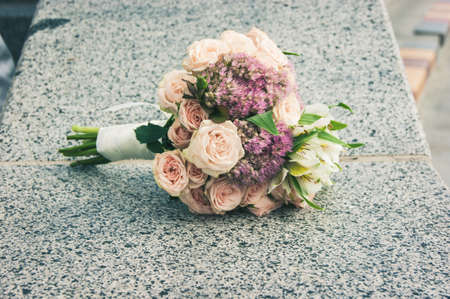 Wedding bouquet of flowers, bride holding flowersの写真素材