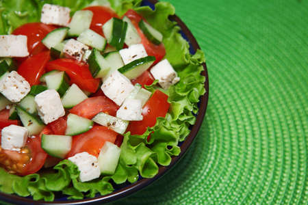 fresh salad with tomato and cucumber green saladの写真素材