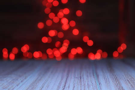 wooden background with lights in the backgroundのeditorial素材