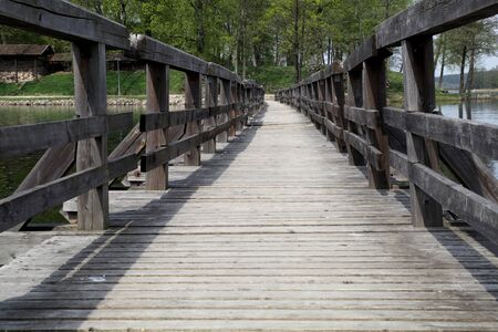 wooden bridge over the river