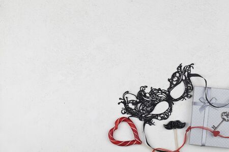 lollipops, decoration, gift and black mask on white background. Valentines day background. love...