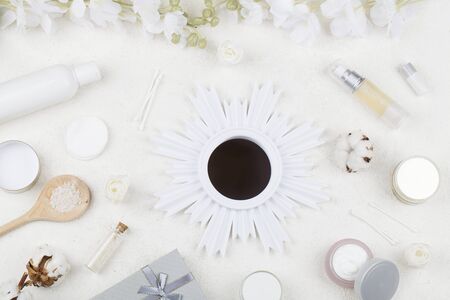 Spa and facial beauty cosmetics with cotton and mirror on white background. Spring skin care trends, top view frame flat lay branding mock up copy space beauty concept gift for womanの写真素材