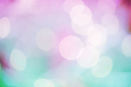abstract bokeh lights on purple and blue background. defocused