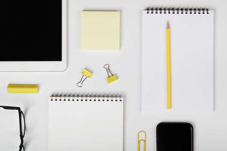 office table desk, workspace with digital tablet, mobile phone, notebook, yellow pencil, office...