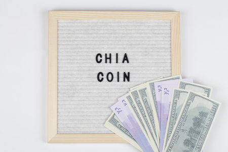 felt letter board with words chia coin with money. Chia cryptocurrency concept